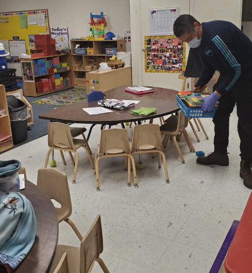 ServiceMaster by Thacker Professionals helps cleaning school tables